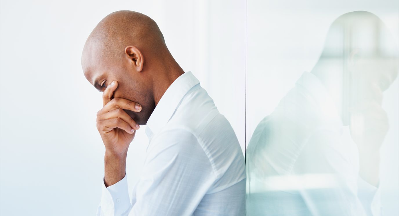 Image of a businessman with a disappointed expression