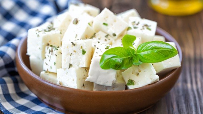 A bowl of feta cheese cubes