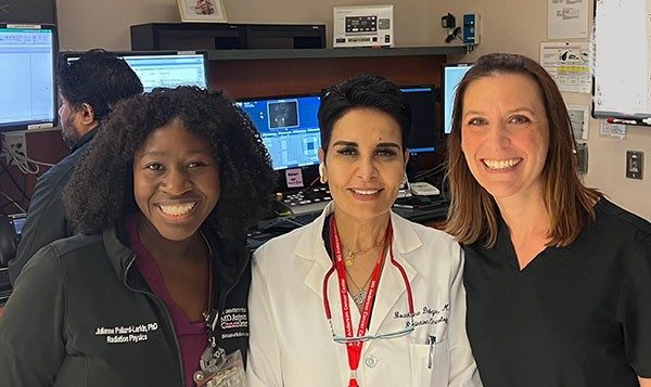 Dr. Julie Pollard-Larkin, Dr. Bouthaina Dabaja and Paige Nitsch during clinic .